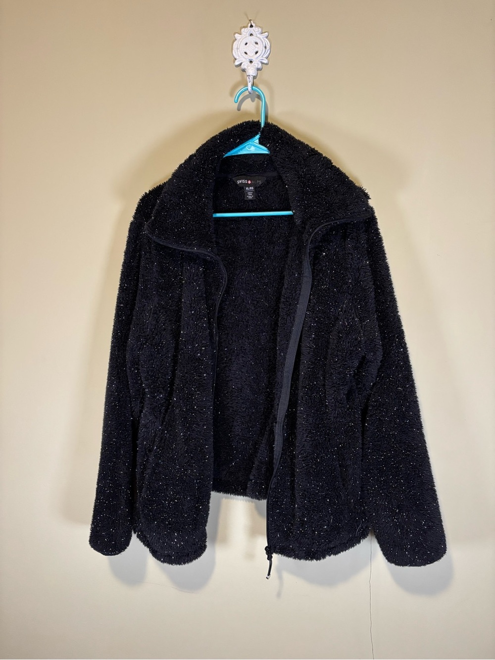 black Swiss Alps brand fleece jacket with a subtle shimmering texture